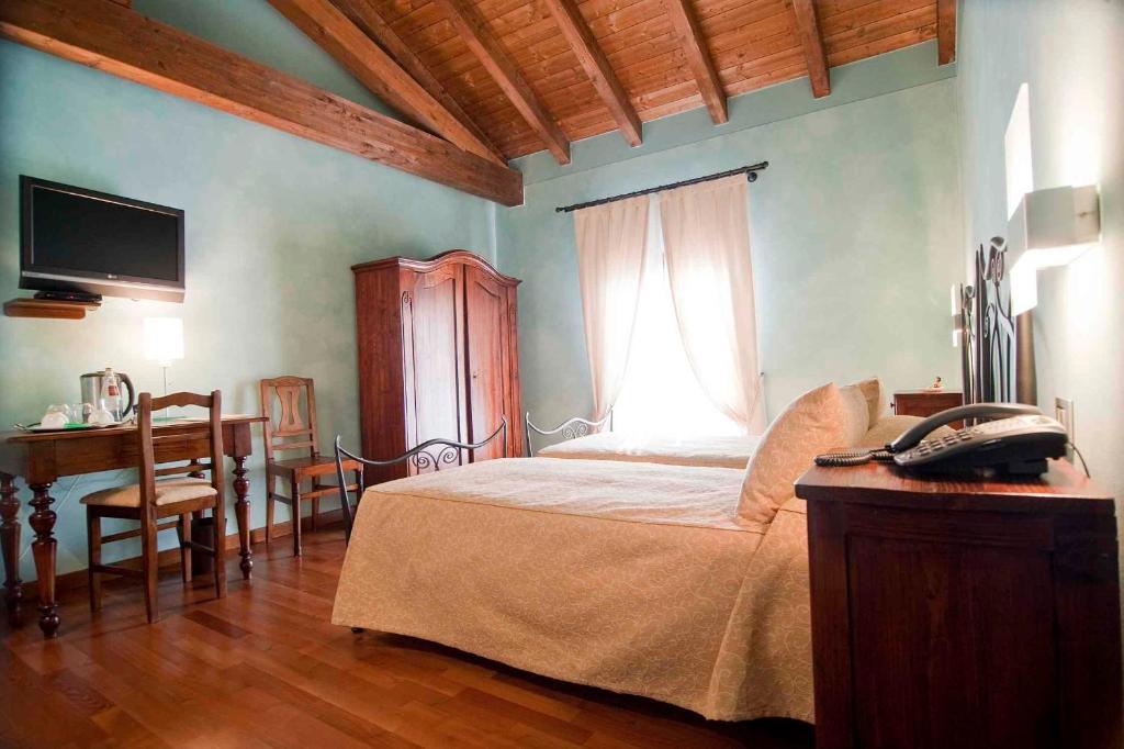 Relais Casa Orter Risano Habitación foto